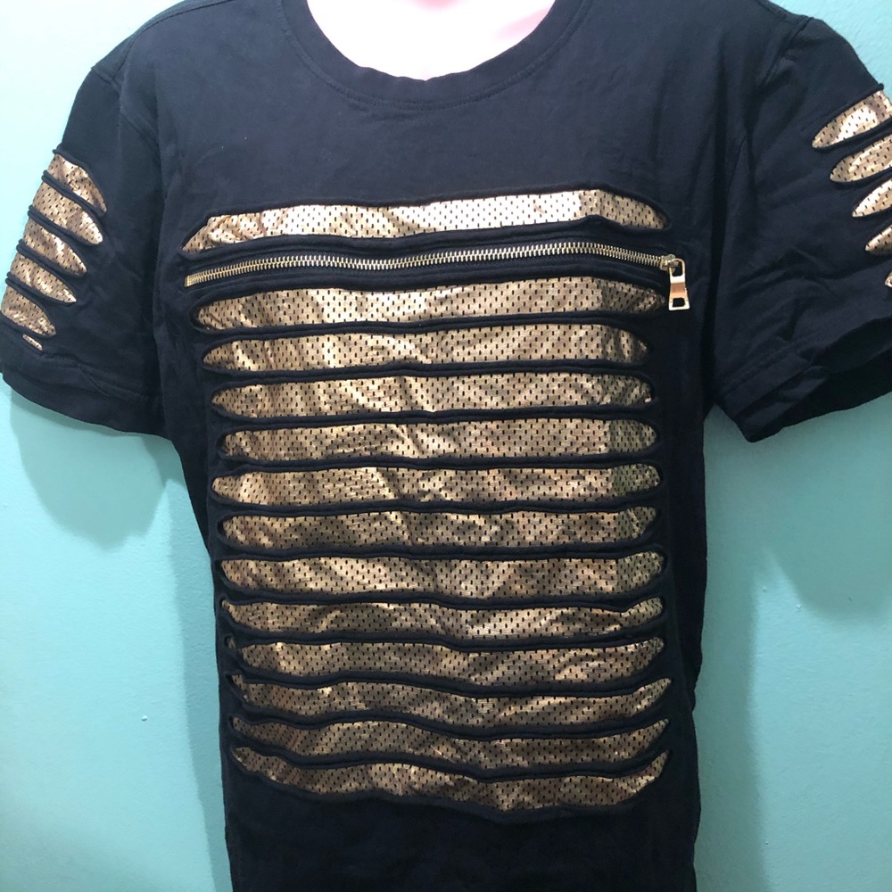 Black and gold zip style top